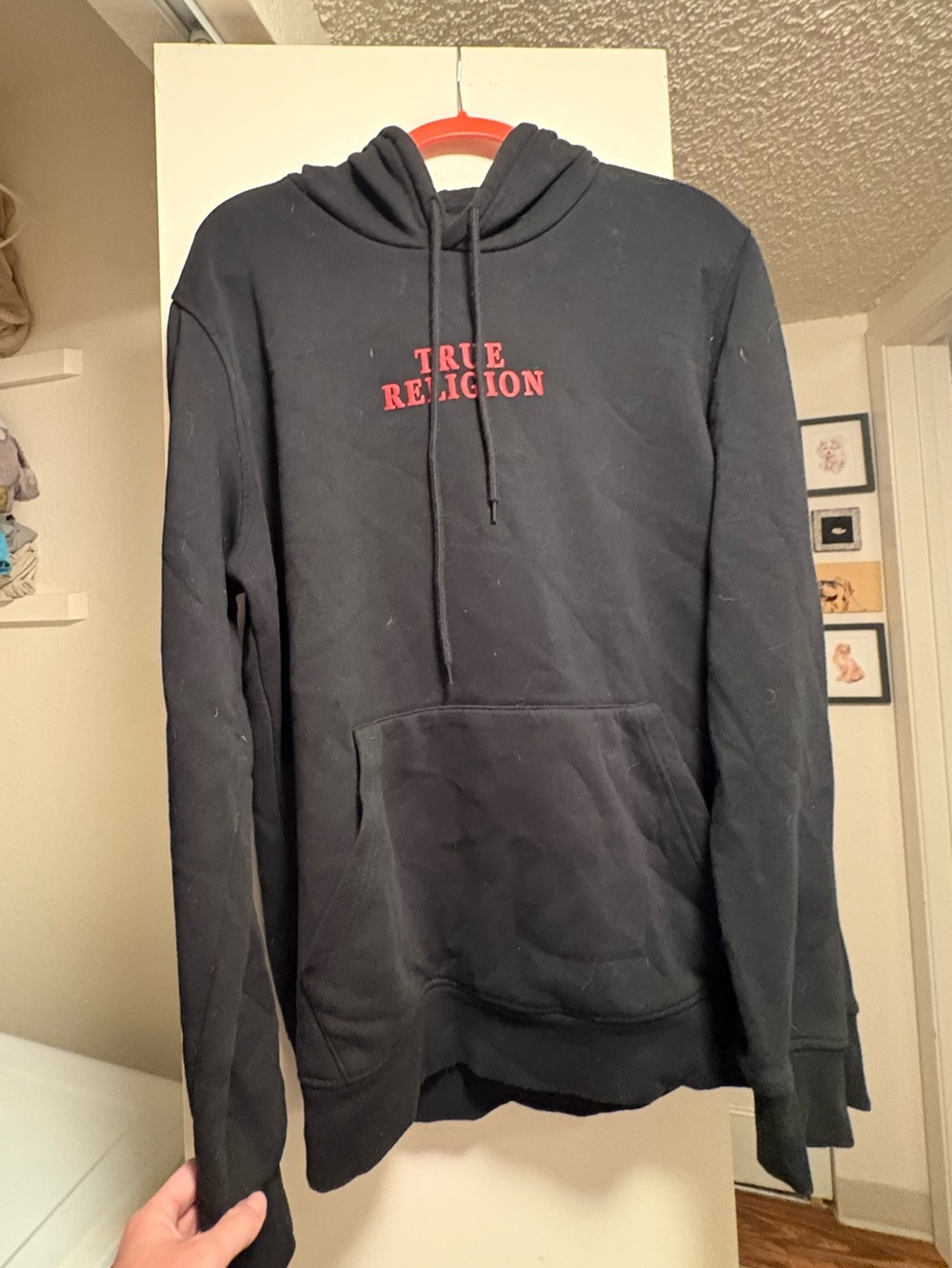 True Religion Black Hoodie with Red Logo front. Buddha back.